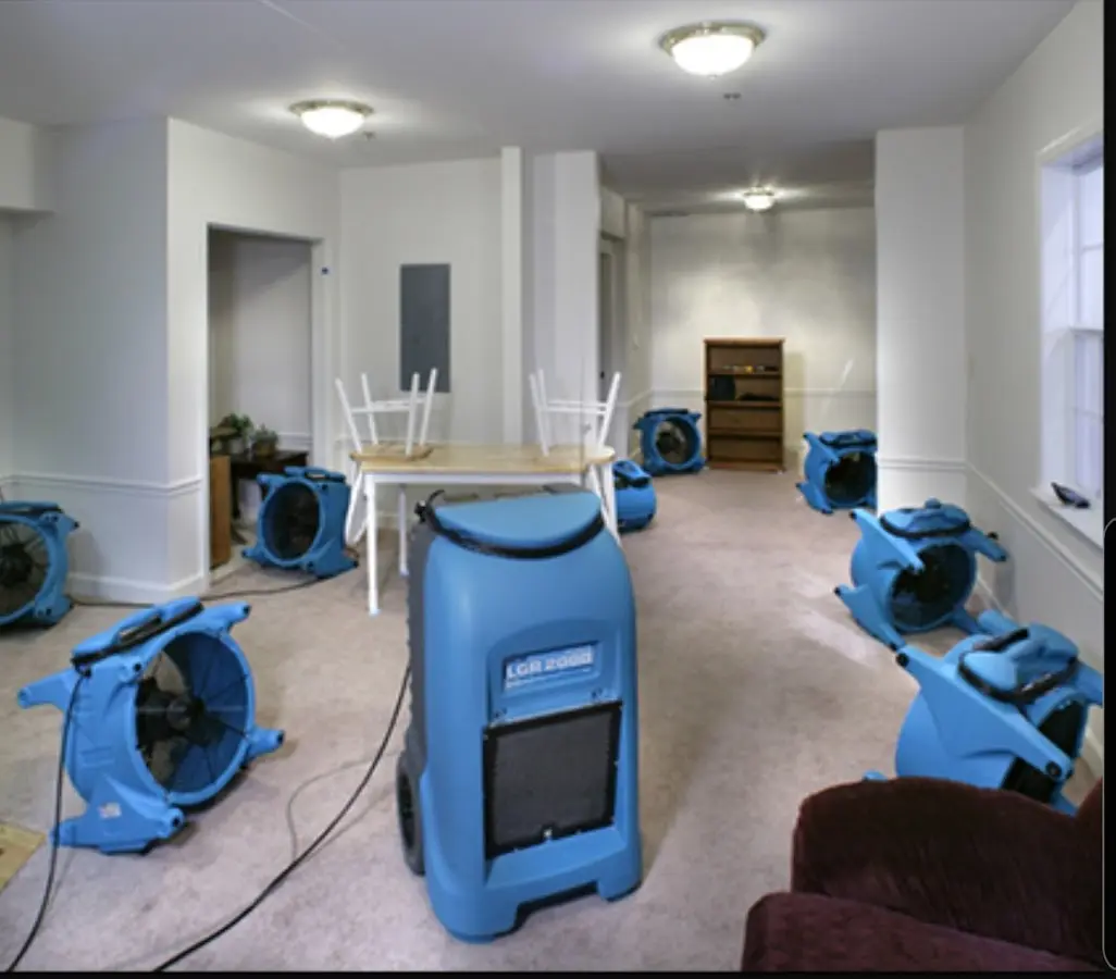 Air movers and dehumidifier setup for Water Damage Restoration in Moores Mill